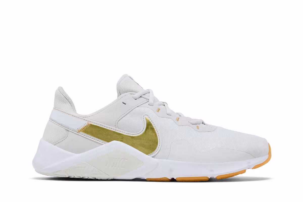 Nike Women's Legend Essential 2 Platinum Tint Metallic Gold Star, view 2