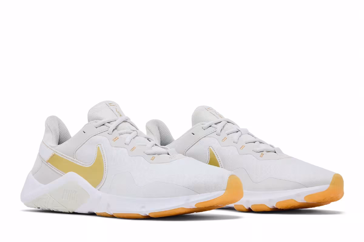 Nike Women's Legend Essential 2 Platinum Tint Metallic Gold Star, view 9