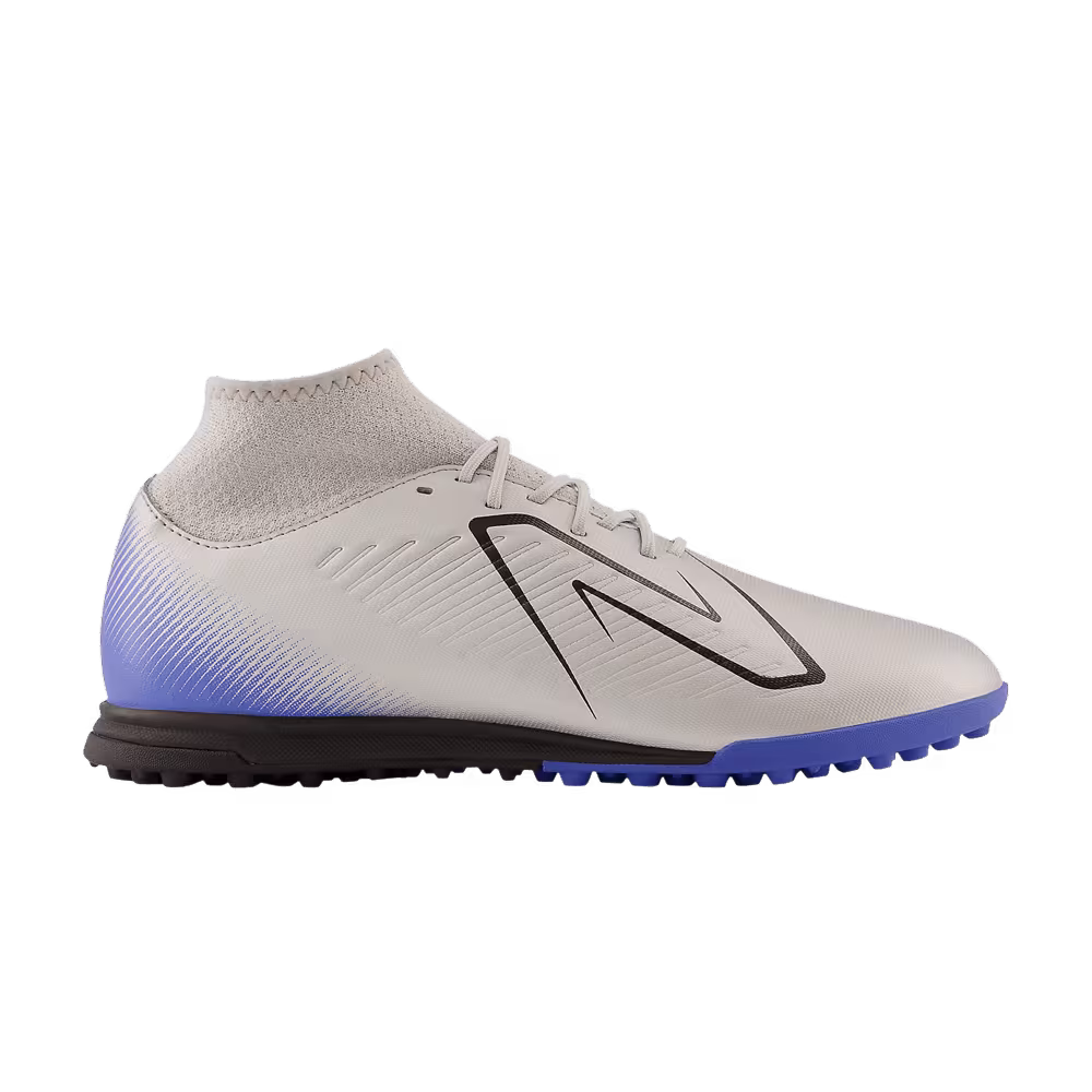 New Balance Tekela v4 Magique TF 2E Wide Headline Taker Pack
